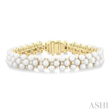 4 MM Interlocked Clover Cultured Pearl and 1 ctw Round Cut Diamond Fashion Bracelet in 14K Yellow Gold