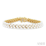 3 MM Interlocked Clover Cultured Pearl and 1 ctw Round Cut Diamond Fashion Bracelet in 14K Yellow Gold