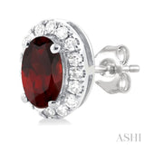 5x3 MM Oval Shape Garnet and 1/8 Ctw Single Cut Diamond Halo Semi-Precious Stud Earrings in 14K White Gold