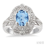 9x7 MM Oval Cut Blue Topaz and 1/50 Ctw Single Cut Diamond Ring in Sterling Silver