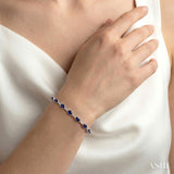 4x3 MM Oval Cut Sapphire and 1/3 Ctw Round Cut Diamond Precious Bracelet in 10K White Gold