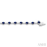 4x3 MM Oval Cut Sapphire and 1/3 Ctw Round Cut Diamond Precious Bracelet in 10K White Gold