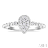 1/8 Ctw Petite Bead Shank Pear Shape Center Round Cut Diamond Fashion Ring in 10K White Gold