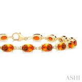 6X4 MM Oval Cut Citrine and 1/6 ctw Round Cut Diamond Semi Precious Tennis Bracelet in 10K Yellow Gold