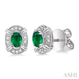 5x3 MM Oval Cut Emerald and 1/10 Ctw Single Cut Diamond Earrings in 14K White Gold