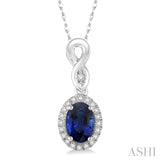 6x4 MM Oval Cut Sapphire and 1/10 Ctw Round Cut Diamond Pendant in 14K White Gold with Chain