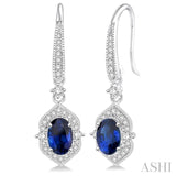5x3 MM Oval Shape Sapphire and 1/3 Ctw Round Cut Diamond Earrings in 14K White Gold