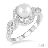1/10 Ctw Round Cut Diamond and Center 7mm Cultured Pearl Twisted Swirl Ring in 10K White Gold